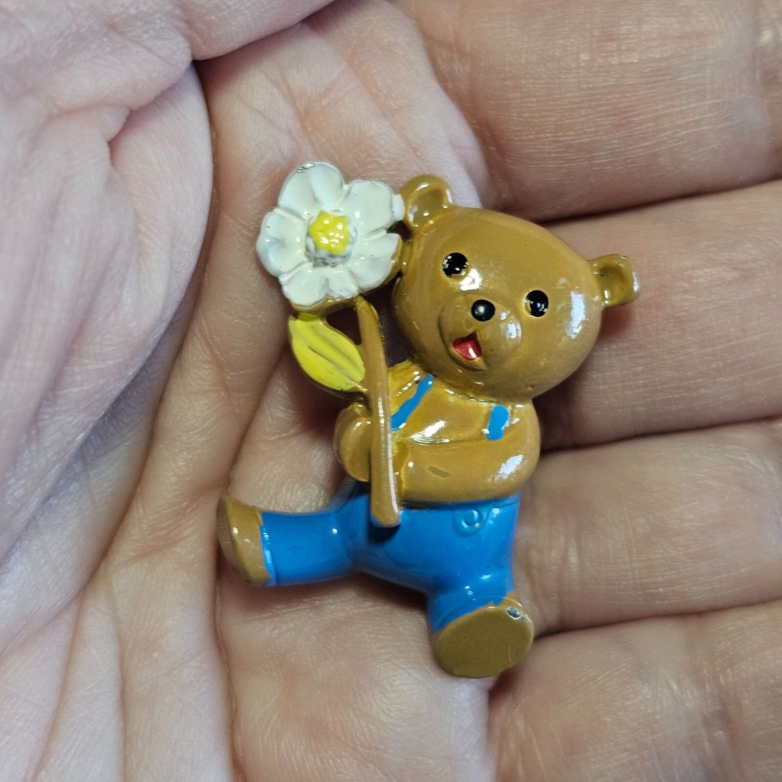 Vintage Painted Metal Brown Bear In Overalls With A Daisy Brooch